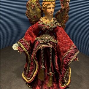 Elegant Red and Gold Angel Sculpture
